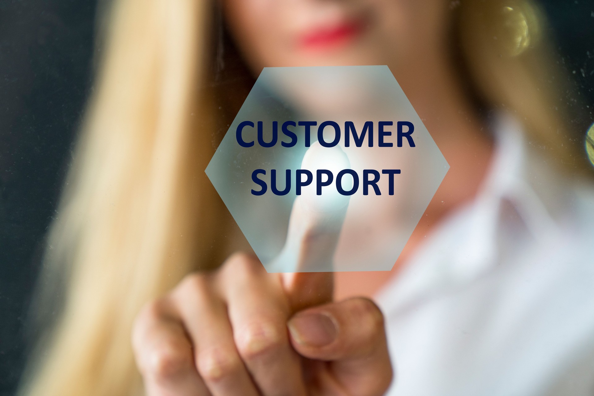business, technology, internet and networking concept – business woman pressing Customer Support button on virtual screens